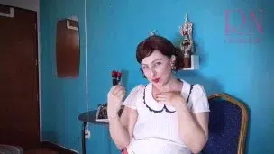 Red lipstick kissing teasing by Regina Noir.