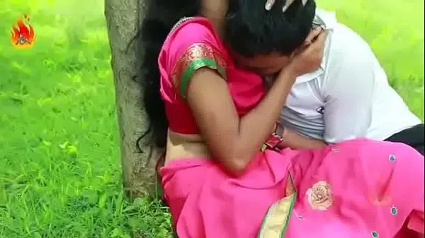 Couple kissing in the park